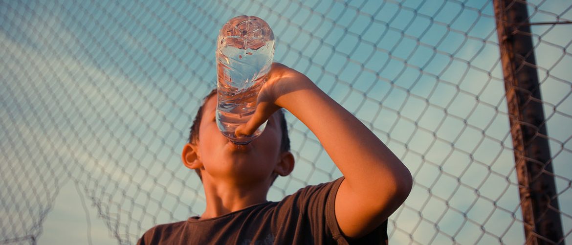 Boy drinking water